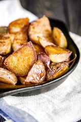 Baked potato wedges with garlic, christmas garnish