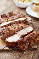 Skewered meat or shish kebabs of pork in marinade