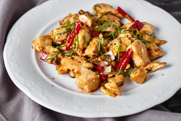 Kung Pao Chicken on wood Background