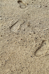 Fototapeta na wymiar Footprints on sand