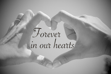 Forever in our hearts quote with beautiful love shape hands, hea