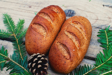 Homemade Bread Baked at Home, Bio Ingredients - Rustic Organic Loaf of bread - Rural Bakery. Natural light, moody background