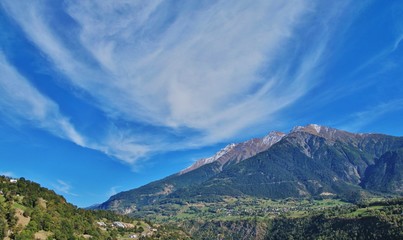 Cirruswolke über den Bergen, Wallis