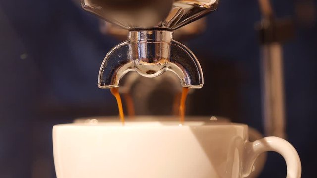 video shows espresso brewing, a nice crema for a perfect espresso shot