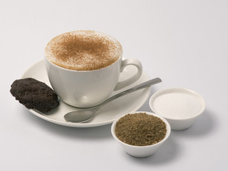 Cappuccino with dark chocolate cookie