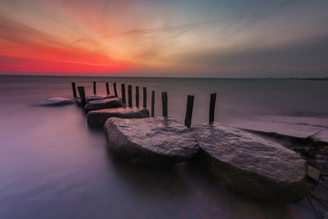 sunrise over the sea, stone harbor, long exposure
