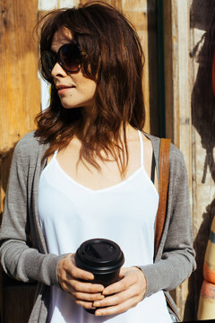 Young Beautiful Woman Standing in Front a Funky Shop Main Door