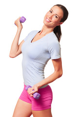 Young woman in sports clothing with hand weights isolated on white background