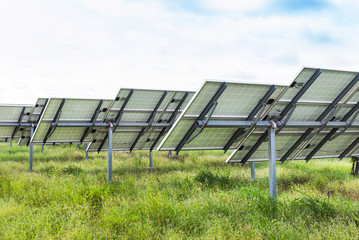 back side view photovoltaics solar panels in solar power station  