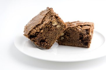 Brownie on white plate.Isolate.