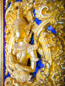the perforate on the door in public temple , this picture is generic art in Thailand it is not trademark in this picture