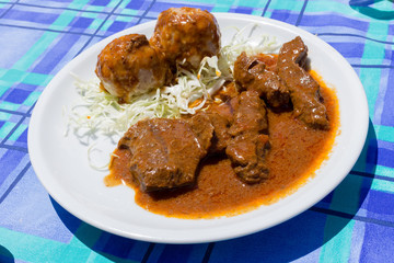Veal stew with dumplings