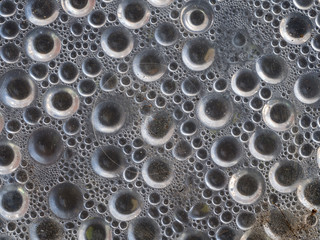 Water Drop Perched on The Plastic