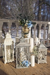 Wedding decor. Old white porch decorated with white lanterns