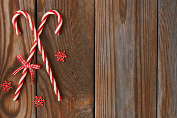 Christmas cane on wooden background