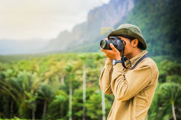 Fototapeta premium photographer on the nature landscape.