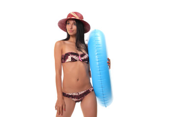 female in bikini holding swimming ring