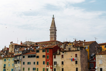 Naklejka premium The historic part of Rovinj in Croatia with the Church of Saint Euphemia.