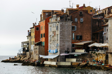 Houses on the edge of the sea in the historical part of the city Rovinj in Croatia.