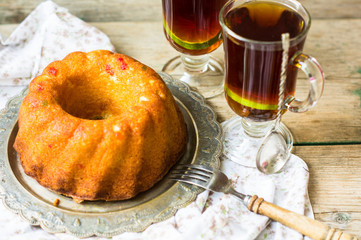 Cake and tea with lemon
