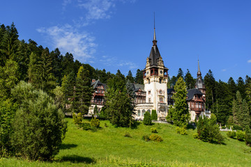 Fototapeta na wymiar Beautiful Peles palace castle in Carpathian mountains of Romania