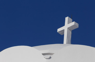 cross on Orthodox Metropolitan Cathedral in Fira town on Santorini