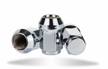 Three deaf wheel nuts on a white background
