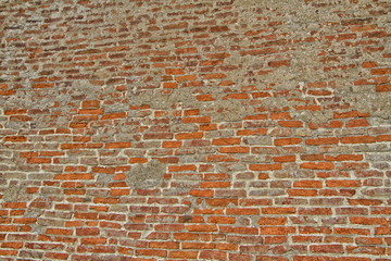 old wall of red brick and gray