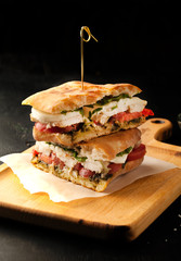 Delicious sandwich with chicken and mozzarella cheese - 123736025