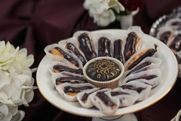Set of the eclair covered with chocolate