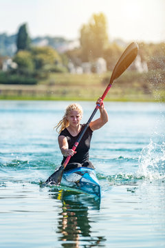 Kayak. Female kayaker on the lake