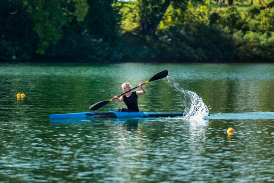 Kayak. Female kayaking champion in action
