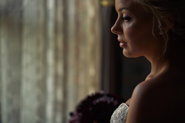 Portrait of the blonde bride before the wedding