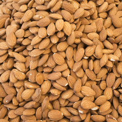 Almond. Almonds fon.Ochischenny almonds. Sale of almonds on the market. It can be used as background food (selective focus)