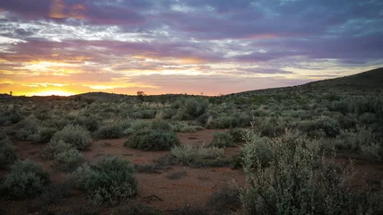 Fototapeten Sonnenuntergang im Outback in Australien © kentauros