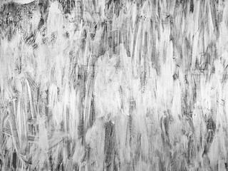 Fototapeta premium Grungy white brush paint background with grain.