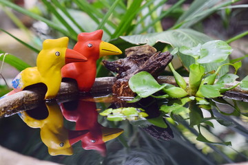 ceramic decorations in small garden.