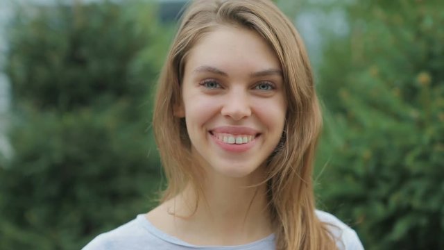 Portrait of a young , attractive girl without makeup with natural hair color