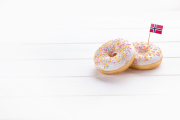Two donuts with flag of Norway