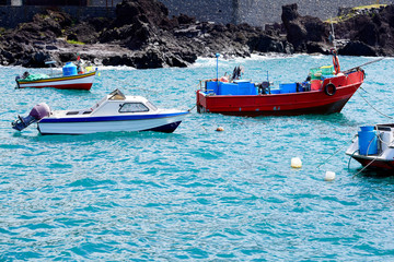 Fototapeta na wymiar some old colored fishing boats