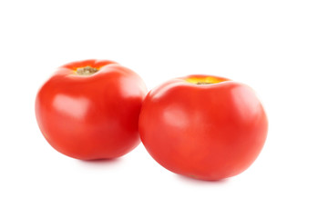Fresh red tomatoes isolated on a white