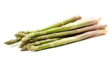 Fresh green asparagus isolated on a white
