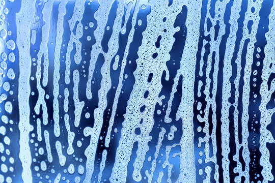 Foam abstract pattern on the glass