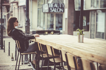 Woman in the street cafe