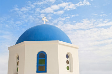 Fototapeta na wymiar orthodox church with blue dome against blue sky