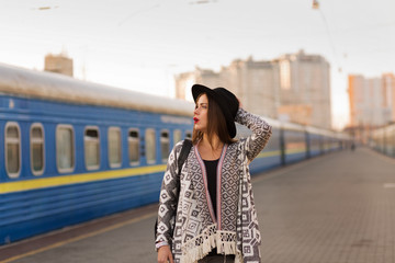 Beautiful woman at the train station