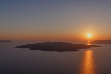 view on sunset behind caldera of Santorini
