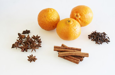 Obraz na płótnie Canvas Clementines and spices, cinnamon, cloves and star anise