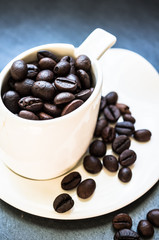 Coffee beans on rustic background