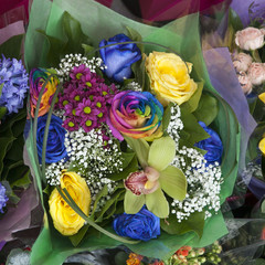 Obraz premium Bouquet of yellow fresia, hyacinth and colorful rose